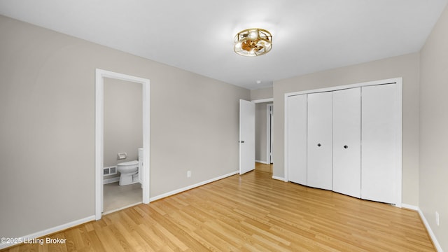 2204 Renown Dr, Jeffersontown, KY 40299 - unfurnished bedroom with light wood-type flooring, a closet, and ensuite bathroom