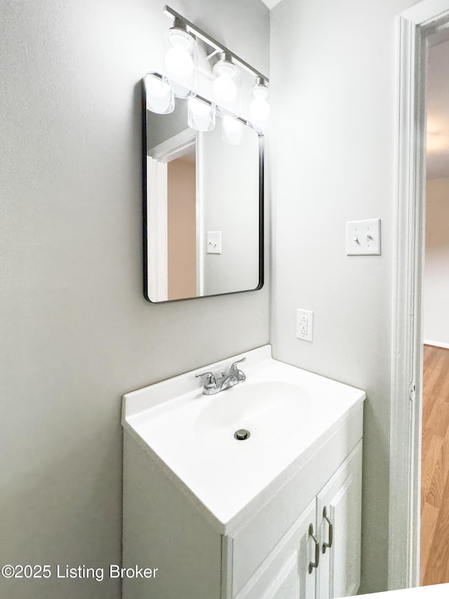 2204 Renown Dr, Jeffersontown, KY 40299 - bathroom featuring vanity and wood finished floors