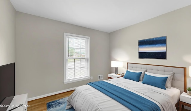 2204 Renown Dr, Jeffersontown, KY 40299 - bedroom with wood finished floors and baseboards