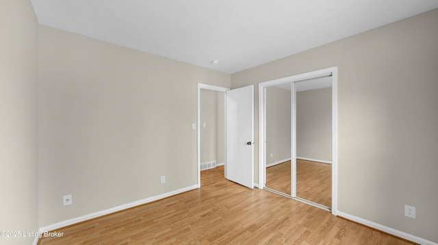2204 Renown Dr, Jeffersontown, KY 40299 - unfurnished bedroom featuring light wood finished floors and a closet