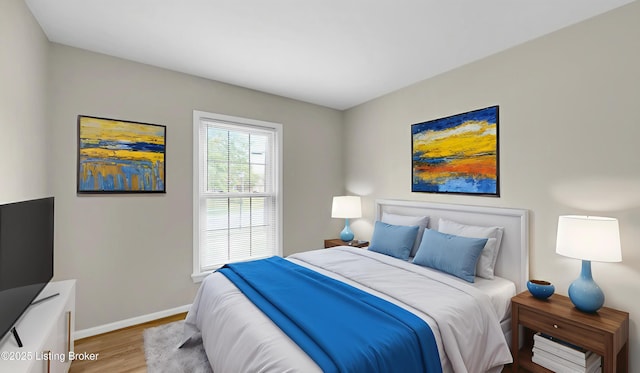 2204 Renown Dr, Jeffersontown, KY 40299 - bedroom with wood finished floors and baseboards