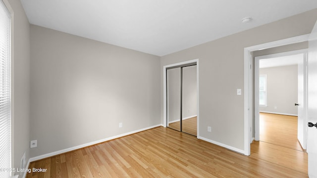 2204 Renown Dr, Jeffersontown, KY 40299 - unfurnished bedroom with light wood-type flooring and a closet