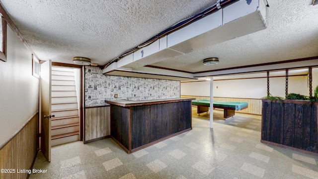 2204 Renown Dr, Jeffersontown, KY 40299 - indoor dry bar with pool table, a textured ceiling, wainscoting, wood walls, and stairs