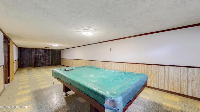 2204 Renown Dr, Jeffersontown, KY 40299 - recreation room with wood walls, a wainscoted wall, a textured ceiling, ornamental molding, and billiards table