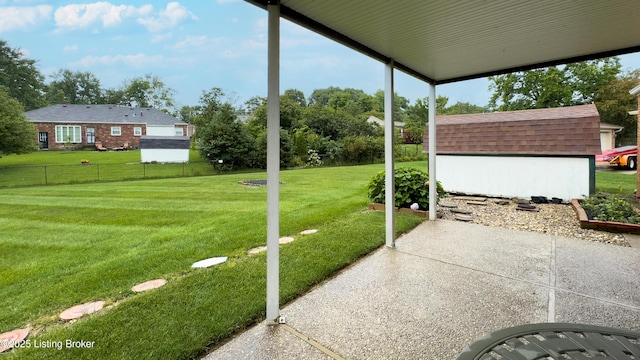 2204 Renown Dr, Jeffersontown, KY 40299 - view of yard featuring a storage shed and a patio area