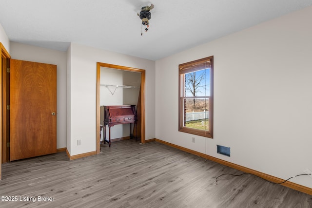 595 Centerview Dr, Shepherdsville, KY 40165 - unfurnished bedroom featuring light wood finished floors and a closet