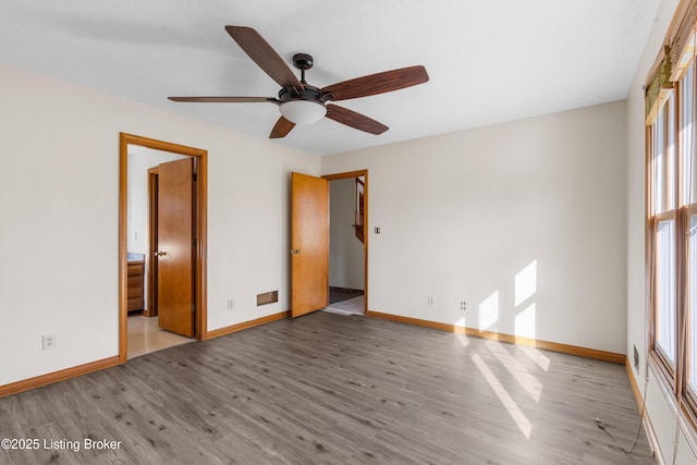 595 Centerview Dr, Shepherdsville, KY 40165 - empty room featuring wood finished floors and ceiling fan