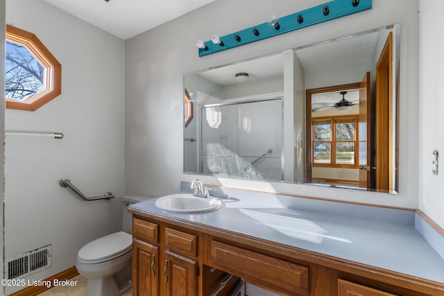 595 Centerview Dr, Shepherdsville, KY 40165 - full bathroom with a stall shower, healthy amount of natural light, vanity, and ceiling fan