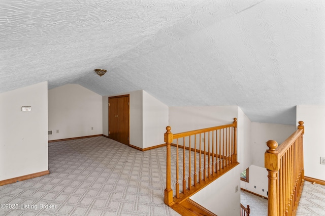 595 Centerview Dr, Shepherdsville, KY 40165 - bonus room featuring light carpet, a textured ceiling, and lofted ceiling