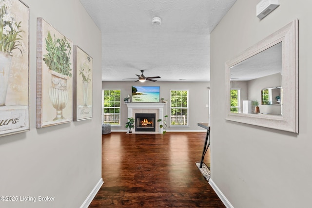 9511 Arrowridge Dr, Louisville, KY 40229 - corridor featuring wood finished floors and a textured ceiling