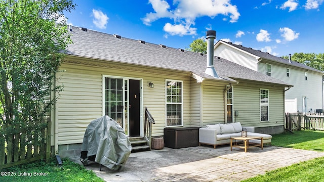 9511 Arrowridge Dr, Louisville, KY 40229 - rear view of house with a patio, outdoor lounge area, entry steps, and a shingled roof