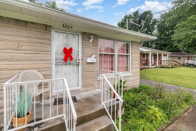 3806 Britt Ln, Louisville, KY 40219 - property entrance with a lawn