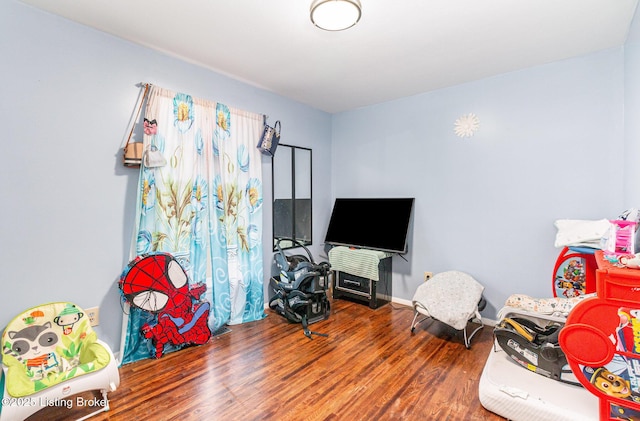 3806 Britt Ln, Louisville, KY 40219 - playroom featuring wood finished floors and baseboards
