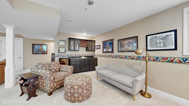 17217 Mallet Hill Dr, Louisville, KY 40245 - living area featuring light carpet, a dry bar, and decorative columns