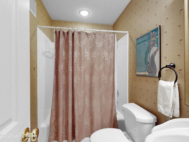 17217 Mallet Hill Dr, Louisville, KY 40245 - bathroom with shower / tub combo and wallpapered walls