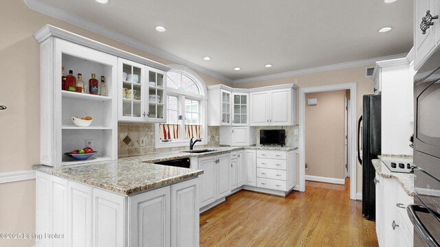 17217 Mallet Hill Dr, Louisville, KY 40245 - kitchen with decorative backsplash, white cabinets, crown molding, glass insert cabinets, and light wood-type flooring