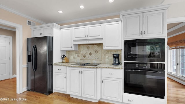 17217 Mallet Hill Dr, Louisville, KY 40245 - kitchen with black appliances, tasteful backsplash, crown molding, light stone counters, and white cabinets