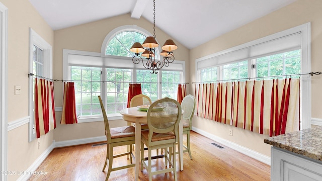 17217 Mallet Hill Dr, Louisville, KY 40245 - dining area with light wood finished floors and a chandelier