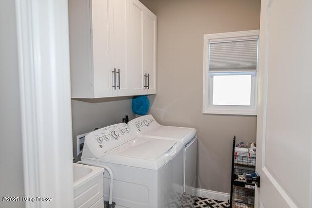 2370 N Borcherding Rd, Madison, IN 47250 - laundry area featuring washer and dryer and cabinet space