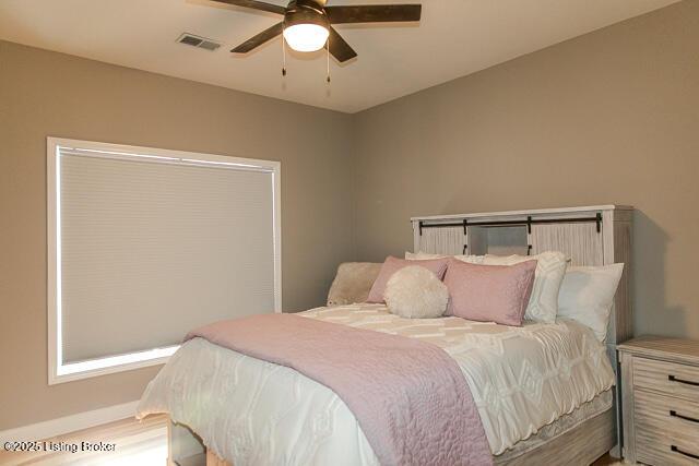 2370 N Borcherding Rd, Madison, IN 47250 - bedroom featuring ceiling fan and baseboards
