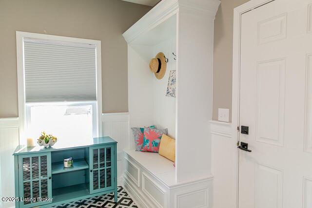 2370 N Borcherding Rd, Madison, IN 47250 - mudroom with wainscoting and a decorative wall