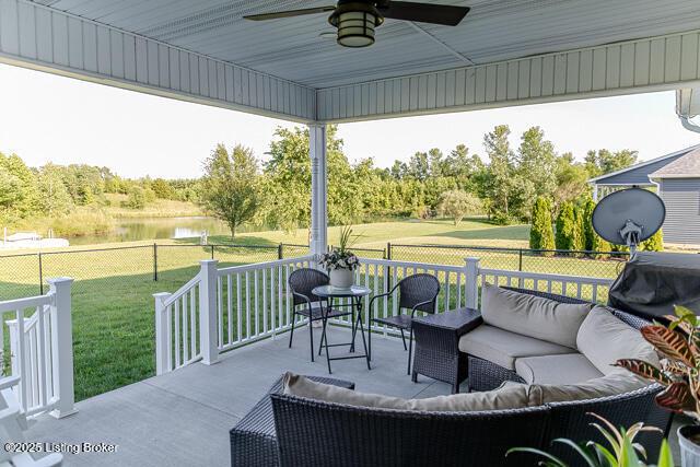 2370 N Borcherding Rd, Madison, IN 47250 - view of patio with an outdoor hangout area, ceiling fan, and a water view