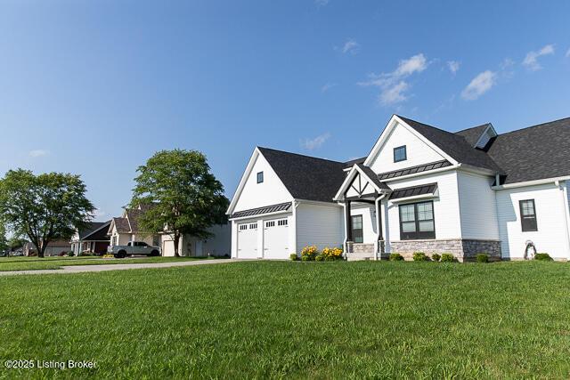 2370 N Borcherding Rd, Madison, IN 47250 - view of front of property with stone siding and a front lawn