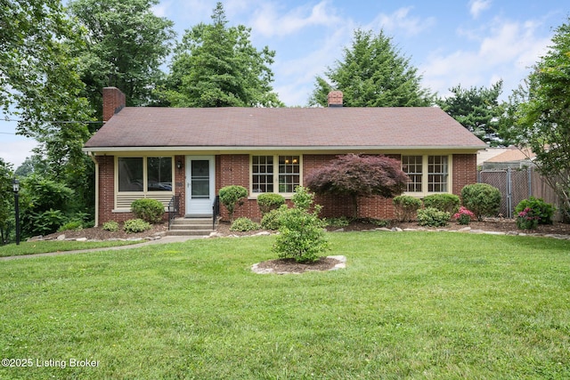 1669 Trigg St, Louisville, KY 40213 - single story home with a chimney and brick siding