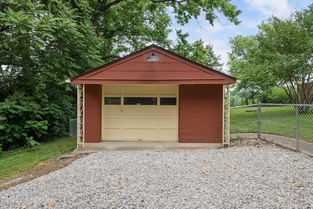 1669 Trigg St, Louisville, KY 40213 - detached garage with gravel driveway