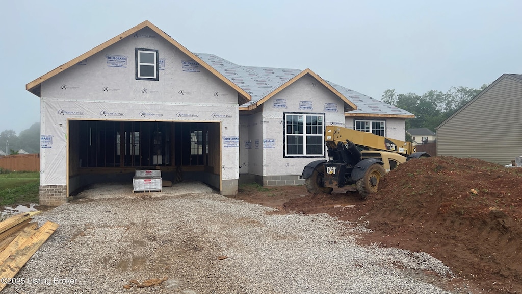 107 Blatina Dr, Vine Grove, KY 40175 - property under construction with a garage and gravel driveway