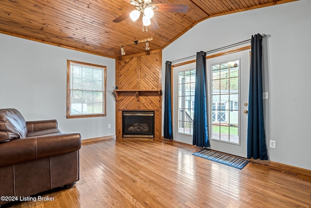2773 Martin Pierce Rd, Cub Run, KY 42729 - living room with wood ceiling, ceiling fan, healthy amount of natural light, a glass covered fireplace, and vaulted ceiling