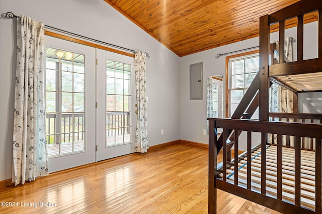 2773 Martin Pierce Rd, Cub Run, KY 42729 - doorway to outside with lofted ceiling, wooden ceiling, healthy amount of natural light, wood finished floors, and electric panel