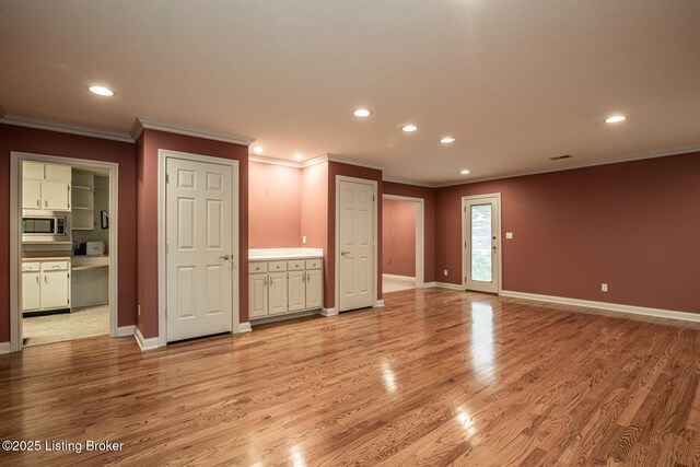 107 Westwood Dr, Elizabethtown, KY 42701 - spare room with recessed lighting, crown molding, and light wood finished floors