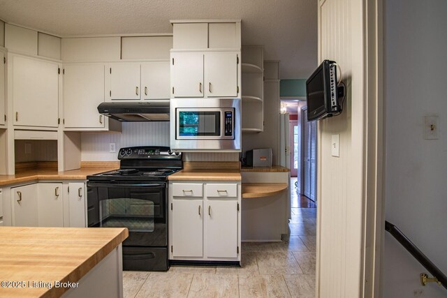 107 Westwood Dr, Elizabethtown, KY 42701 - kitchen featuring electric range, stainless steel microwave, under cabinet range hood, open shelves, and white cabinets