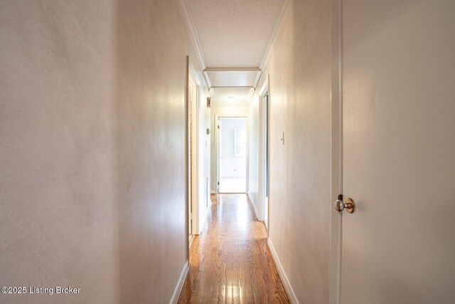 107 Westwood Dr, Elizabethtown, KY 42701 - hall featuring ornamental molding, wood finished floors, and attic access