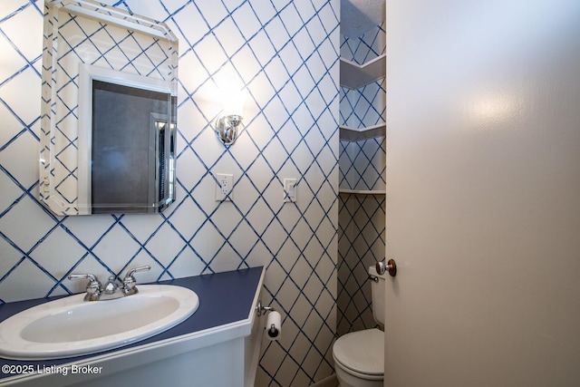 107 Westwood Dr, Elizabethtown, KY 42701 - half bathroom with tile walls, vanity, and tasteful backsplash