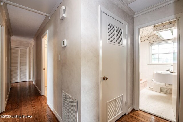 107 Westwood Dr, Elizabethtown, KY 42701 - hall featuring wood finished floors and crown molding