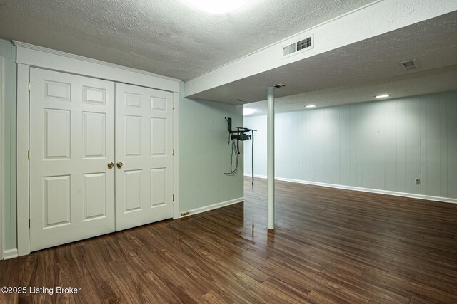 107 Westwood Dr, Elizabethtown, KY 42701 - finished basement with wood finished floors and a textured ceiling