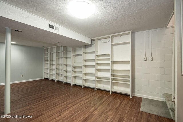 107 Westwood Dr, Elizabethtown, KY 42701 - finished below grade area with dark wood-style floors and a textured ceiling