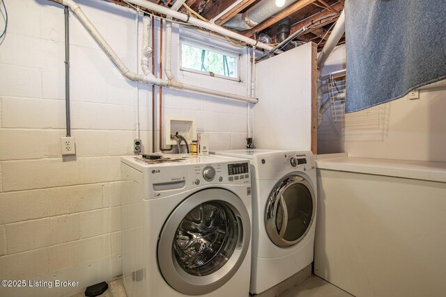 107 Westwood Dr, Elizabethtown, KY 42701 - laundry area with separate washer and dryer and concrete block wall