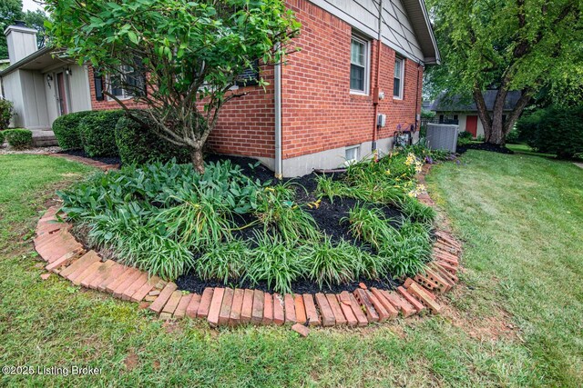 107 Westwood Dr, Elizabethtown, KY 42701 - view of property exterior featuring brick siding and a lawn