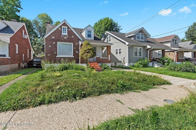 1120 Dresden Ave, Louisville, KY 40215 - view of front of property featuring brick siding and a chimney