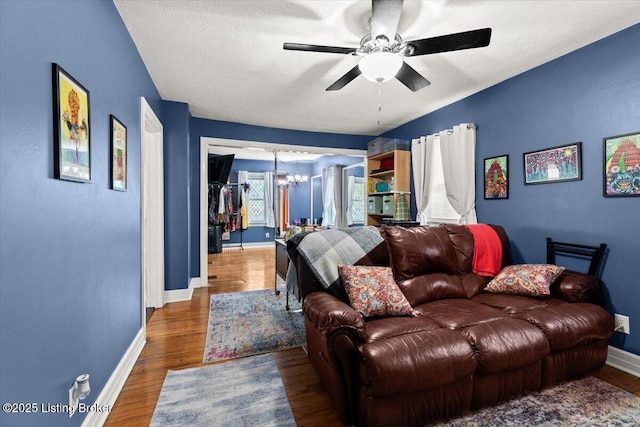 1120 Dresden Ave, Louisville, KY 40215 - living room featuring a chandelier, ceiling fan, and wood finished floors