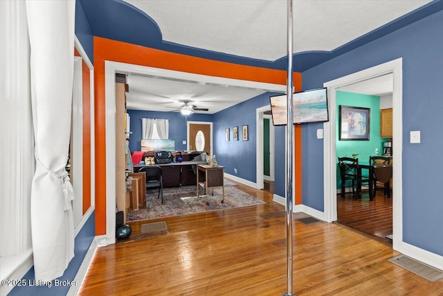 1120 Dresden Ave, Louisville, KY 40215 - office with wood finished floors, a textured ceiling, and a ceiling fan