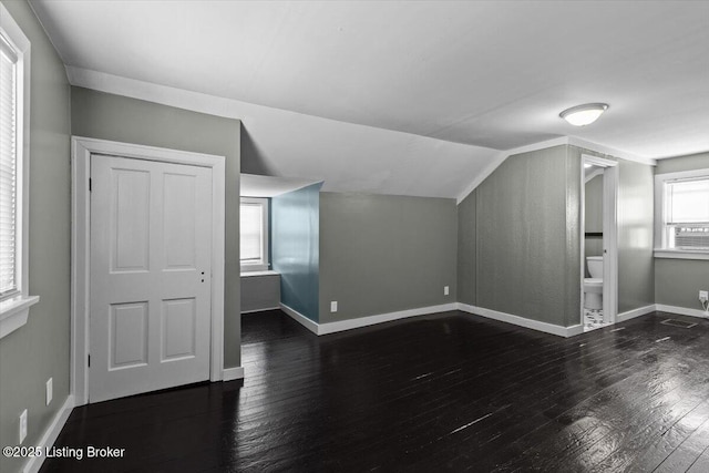 1120 Dresden Ave, Louisville, KY 40215 - additional living space featuring dark wood-type flooring and vaulted ceiling
