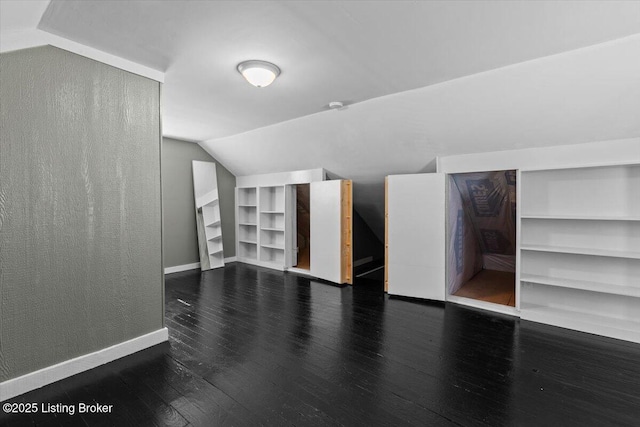 1120 Dresden Ave, Louisville, KY 40215 - additional living space featuring wood finished floors, built in shelves, and lofted ceiling