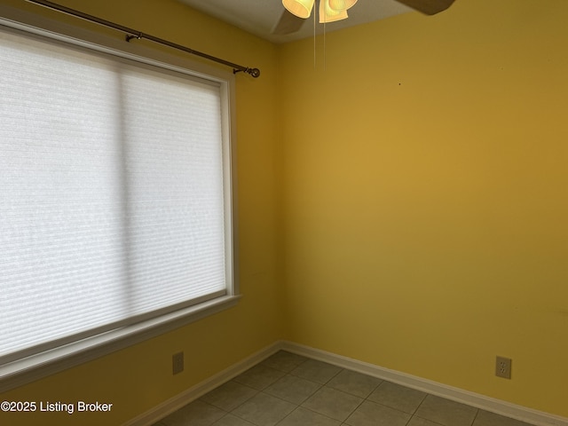 487 Piping Rock Rd, Brandenburg, KY 40108 - empty room with a ceiling fan and tile patterned floors