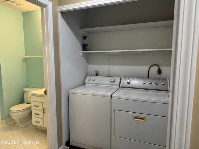 487 Piping Rock Rd, Brandenburg, KY 40108 - washroom featuring washer and dryer and light tile patterned floors