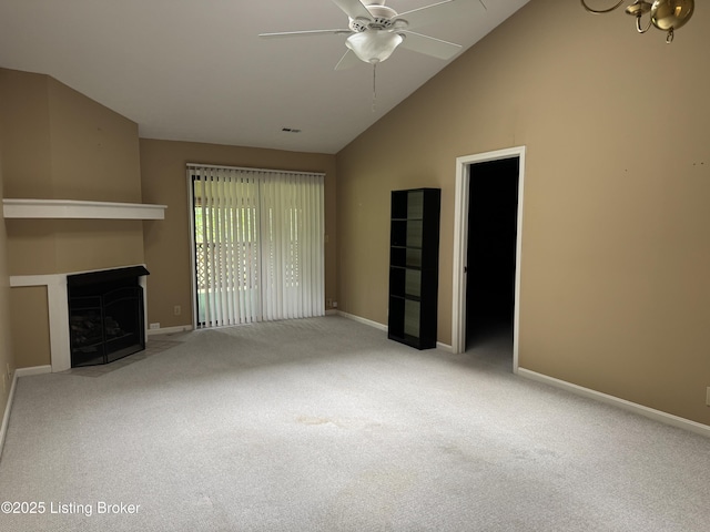 487 Piping Rock Rd, Brandenburg, KY 40108 - unfurnished living room featuring a ceiling fan, carpet flooring, a fireplace with flush hearth, and high vaulted ceiling