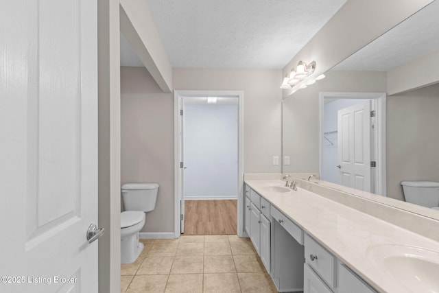 4331 Ivy Crest Cir, Louisville, KY 40241 - full bath featuring double vanity, tile patterned floors, and a textured ceiling